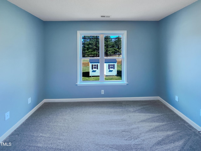357 Riverwood Dr, Clayton, NC 27527 - carpeted spare room with baseboards and visible vents
