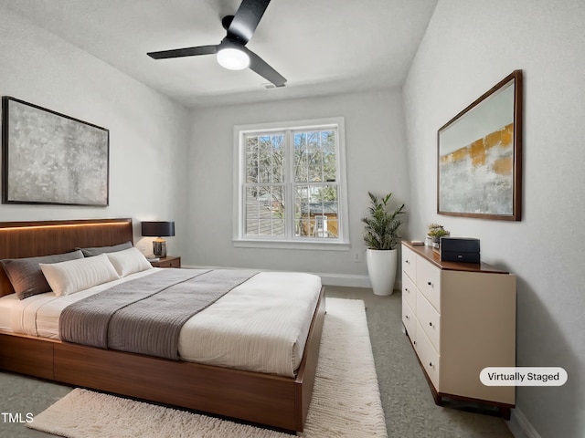 bedroom with carpet flooring, a ceiling fan, and baseboards