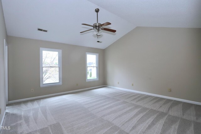 3313 Sparrowhawk Dr, High Point, NC 27265 - carpeted empty room featuring visible vents, baseboards, vaulted ceiling, and ceiling fan