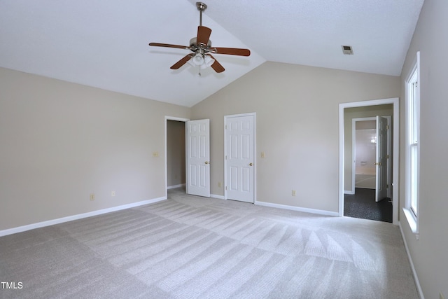 3313 Sparrowhawk Dr, High Point, NC 27265 - unfurnished bedroom with visible vents, baseboards, carpet, and vaulted ceiling
