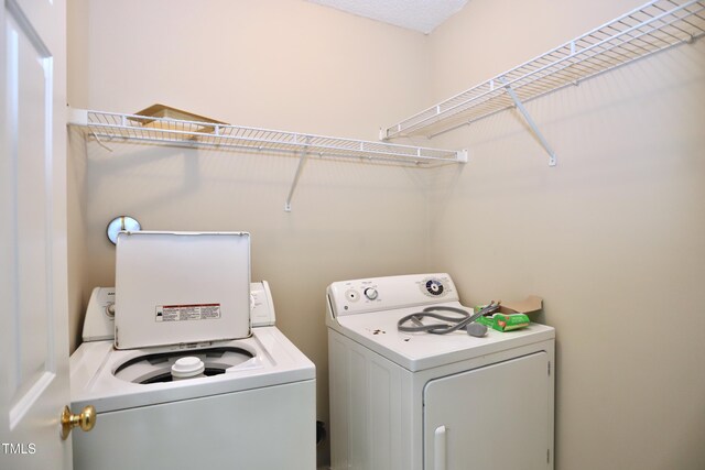 3313 Sparrowhawk Dr, High Point, NC 27265 - washroom with separate washer and dryer and laundry area