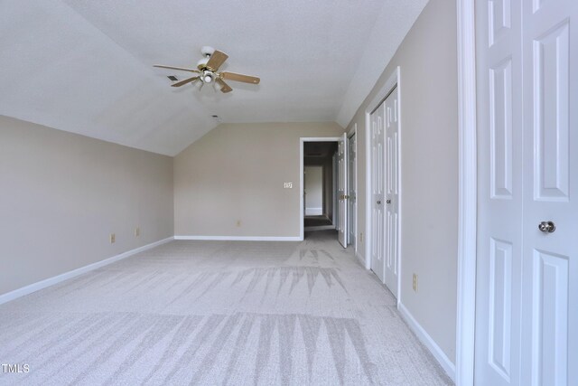 3313 Sparrowhawk Dr, High Point, NC 27265 - additional living space with lofted ceiling, light colored carpet, baseboards, and ceiling fan