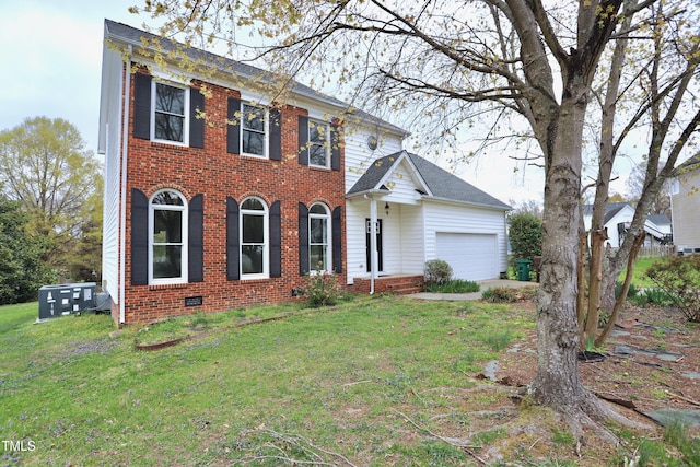 3313 Sparrowhawk Dr, High Point, NC 27265 - view of front of house with a garage, brick siding, crawl space, and a front lawn