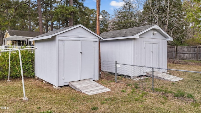 116 Lakewood Dr, Wendell, NC 27591 - view of shed featuring fence