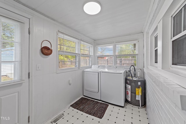 116 Lakewood Dr, Wendell, NC 27591 - laundry area featuring plenty of natural light, independent washer and dryer, laundry area, and electric water heater