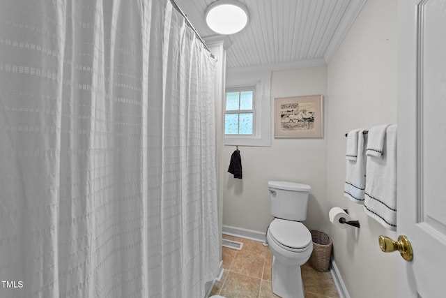 116 Lakewood Dr, Wendell, NC 27591 - bathroom featuring tile patterned floors, toilet, crown molding, and baseboards