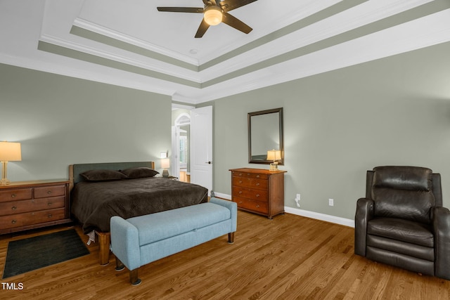 1808 Pattersons Mill Rd, Durham, NC 27703 - bedroom with ceiling fan, ornamental molding, wood finished floors, a raised ceiling, and baseboards