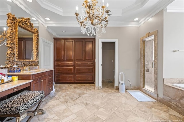 bathroom featuring a tray ceiling, ornamental molding, a chandelier, a stall shower, and a bath