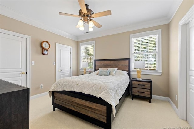 bedroom featuring light colored carpet, ornamental molding, and baseboards