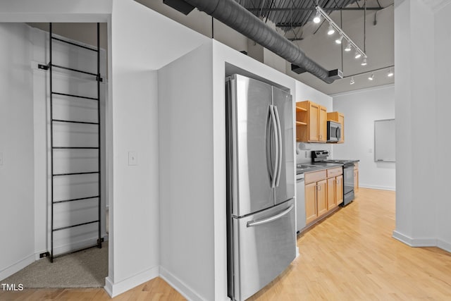 kitchen featuring rail lighting, light brown cabinetry, open shelves, stainless steel appliances, and light wood finished floors