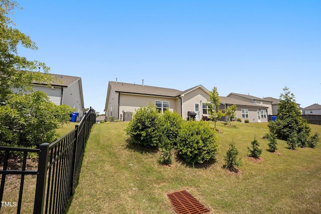 rear view of property with central air condition unit