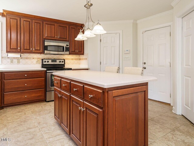 2213 Ravens Creek Ct, Raleigh, NC 27603 - kitchen featuring hanging light fixtures, light countertops, crown molding, stainless steel appliances, and decorative backsplash