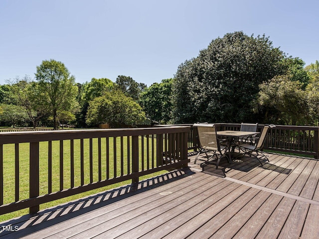 2213 Ravens Creek Ct, Raleigh, NC 27603 - wooden terrace featuring outdoor dining space and a yard