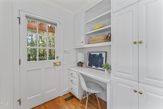 3911 Hope Valley Rd, Durham, NC 27707 - office space with ornamental molding, built in study area, and light wood-type flooring