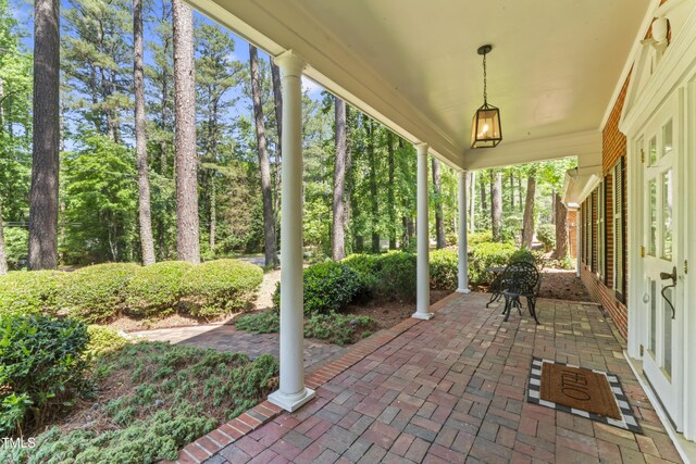 3911 Hope Valley Rd, Durham, NC 27707 - porch featuring view of wooded area