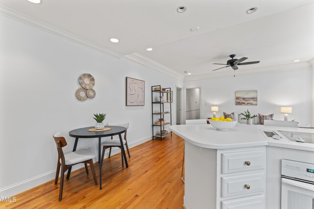 3911 Hope Valley Rd, Durham, NC 27707 - kitchen featuring white appliances, ornamental molding, light countertops, baseboards, and light wood-type flooring