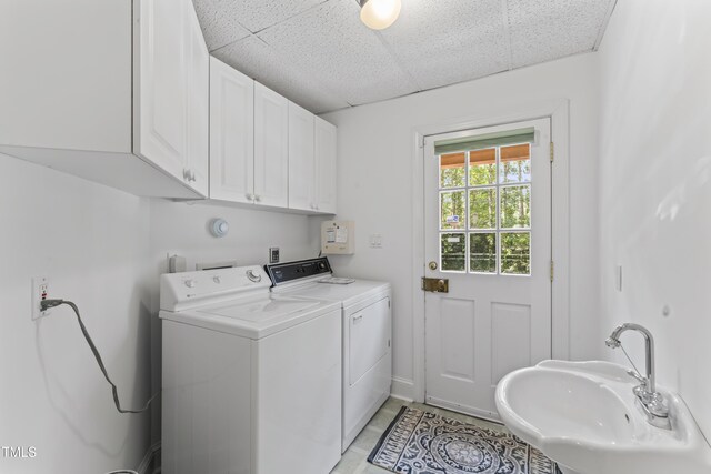 3911 Hope Valley Rd, Durham, NC 27707 - laundry room featuring washer and dryer and cabinet space