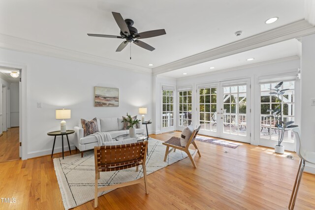 3911 Hope Valley Rd, Durham, NC 27707 - living room with french doors, crown molding, light wood finished floors, ceiling fan, and baseboards