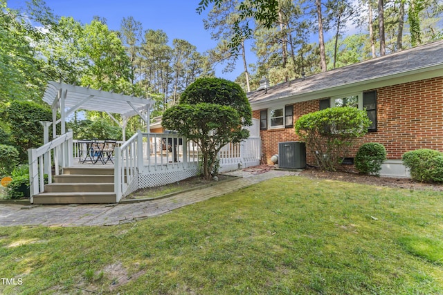 3911 Hope Valley Rd, Durham, NC 27707 - view of green lawn with a pergola, central AC, and a deck