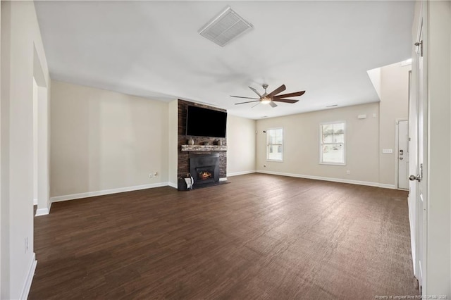 4644 Woodline Dr, Fayetteville, NC 28314 - unfurnished living room featuring baseboards, visible vents, a fireplace, and a ceiling fan