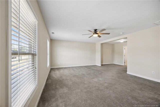 4644 Woodline Dr, Fayetteville, NC 28314 - carpeted empty room with a ceiling fan, baseboards, and visible vents