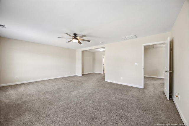 4644 Woodline Dr, Fayetteville, NC 28314 - carpeted empty room featuring baseboards, a ceiling fan, and visible vents