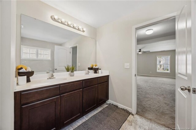 4644 Woodline Dr, Fayetteville, NC 28314 - full bath with a healthy amount of sunlight, ceiling fan, a sink, and double vanity