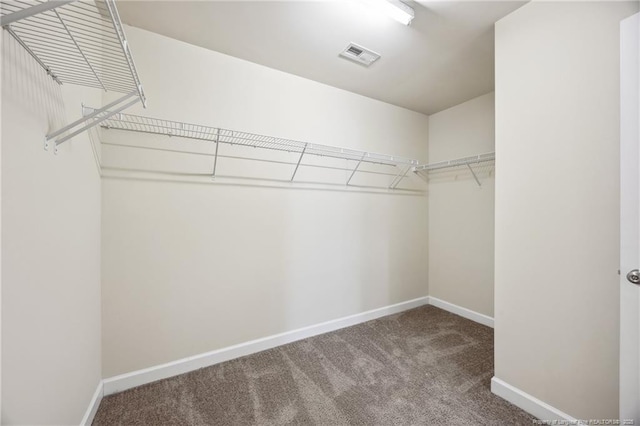 4644 Woodline Dr, Fayetteville, NC 28314 - spacious closet featuring carpet and visible vents