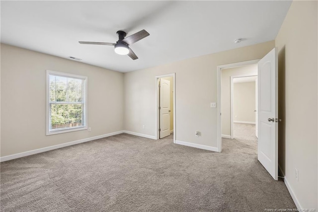 4644 Woodline Dr, Fayetteville, NC 28314 - unfurnished bedroom with visible vents, baseboards, a ceiling fan, and carpet floors
