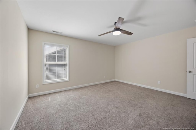 4644 Woodline Dr, Fayetteville, NC 28314 - empty room with carpet flooring, visible vents, baseboards, and a ceiling fan