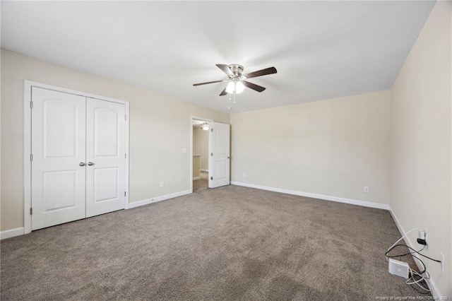 4644 Woodline Dr, Fayetteville, NC 28314 - unfurnished bedroom with carpet flooring, baseboards, and a closet