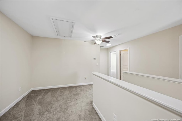 4644 Woodline Dr, Fayetteville, NC 28314 - carpeted spare room with baseboards, attic access, and a ceiling fan