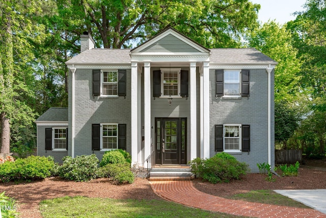 2704 Fairview Rd, Raleigh, NC 27608 - greek revival inspired property with brick siding and a chimney