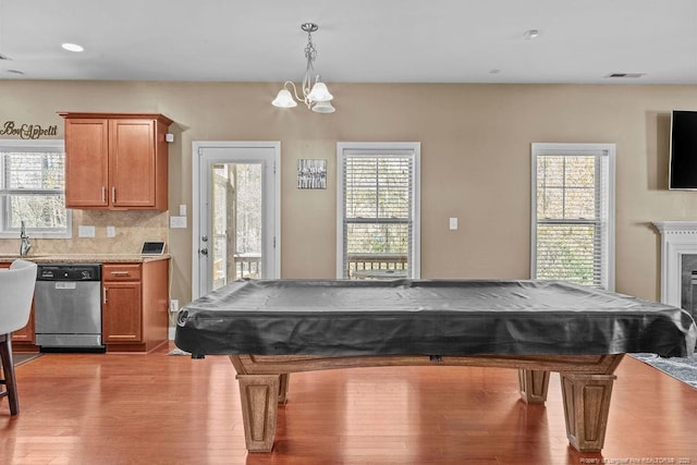 178 Tun Tavern Dr, Cameron, NC 28326 - recreation room with billiards, light wood-style flooring, a chandelier, plenty of natural light, and recessed lighting