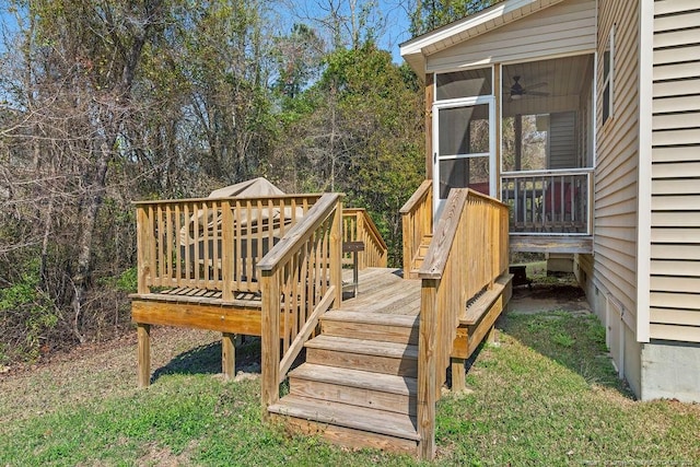 178 Tun Tavern Dr, Cameron, NC 28326 - wooden deck with a sunroom and stairs