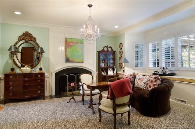 living area with a large fireplace, visible vents, ornamental molding, recessed lighting, and an inviting chandelier
