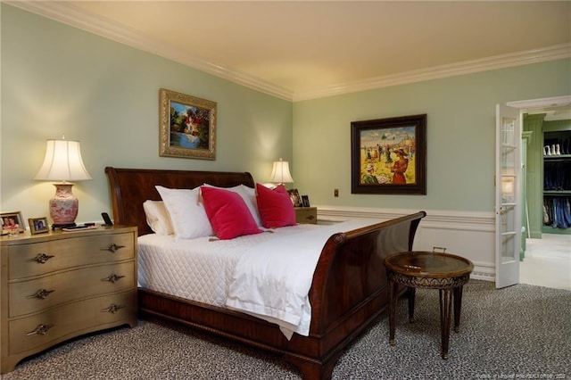 carpeted bedroom featuring crown molding