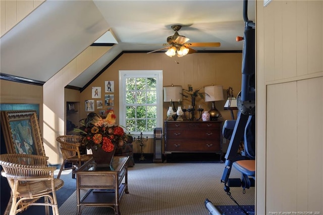 interior space with vaulted ceiling, carpet floors, and a ceiling fan