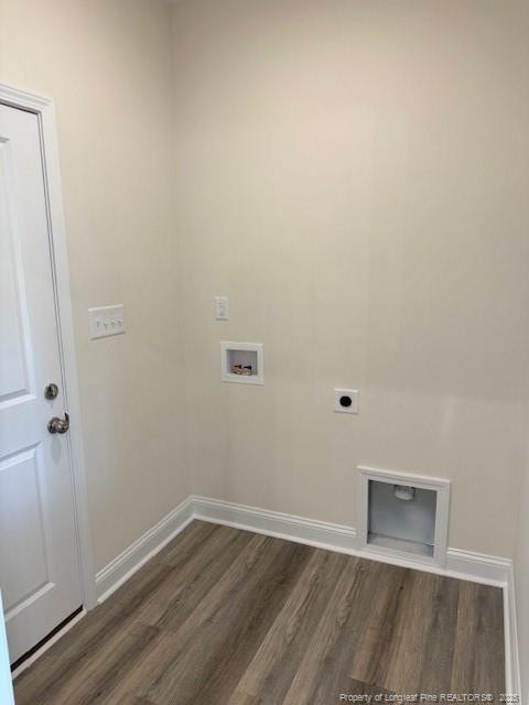 laundry area with laundry area, hookup for an electric dryer, hookup for a washing machine, baseboards, and dark wood-style floors