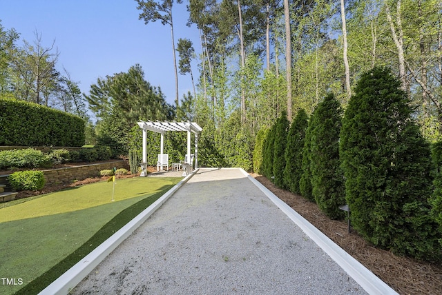 view of home's community featuring a pergola