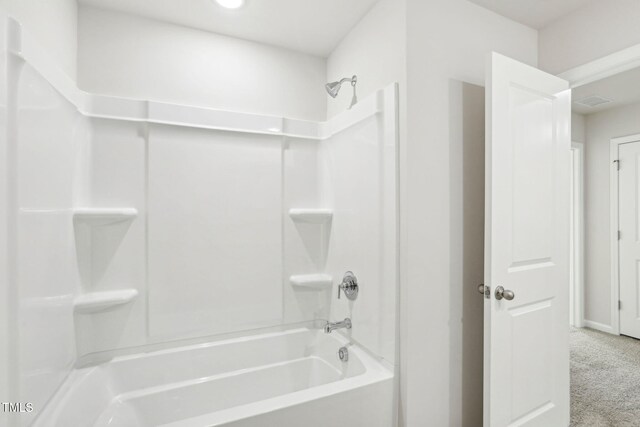 3849 Rosebush Dr, Zebulon, NC 27597 - bathroom with washtub / shower combination and baseboards