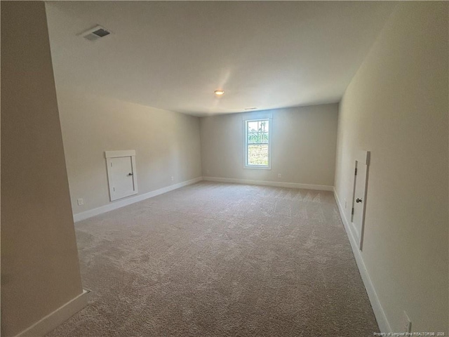 505 Chason Rd, Lumber Bridge, NC 28357 - spare room with light colored carpet, baseboards, and recessed lighting