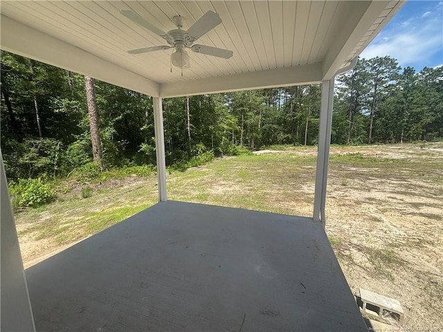 505 Chason Rd, Lumber Bridge, NC 28357 - view of patio featuring ceiling fan and view of scattered trees