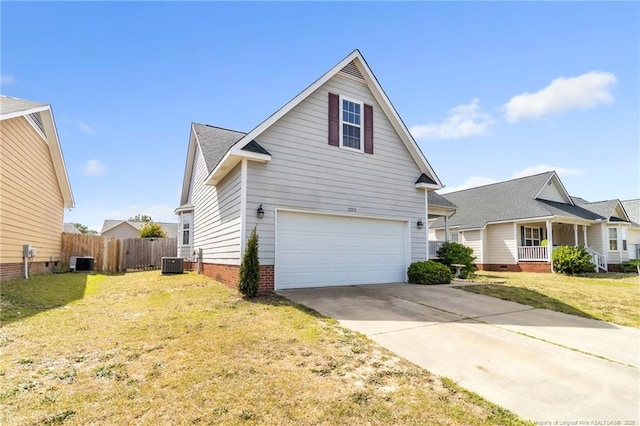 2220 Chasewater Rd, Fayetteville, NC 28306 - traditional home featuring fence, a front lawn, a garage, central AC unit, and driveway