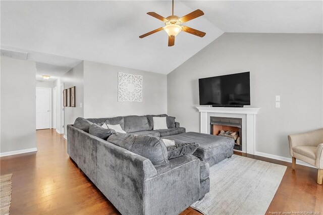 2220 Chasewater Rd, Fayetteville, NC 28306 - living area featuring visible vents, ceiling fan, wood finished floors, and lofted ceiling