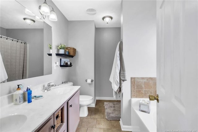 2220 Chasewater Rd, Fayetteville, NC 28306 - full bath featuring toilet, double vanity, baseboards, and a sink