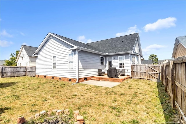 2220 Chasewater Rd, Fayetteville, NC 28306 - back of house with a yard, crawl space, a shingled roof, and a fenced backyard