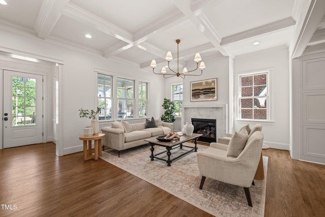 living area featuring recessed lighting, coffered ceiling, and baseboards