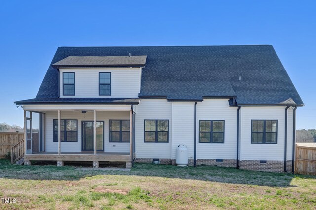 view of front of house featuring crawl space, a shingled roof, and fence