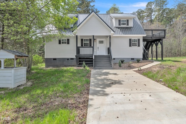 852 Fred Wilder Rd, Franklinton, NC 27525 - bungalow-style house featuring crawl space, stairs, a porch, and metal roof
